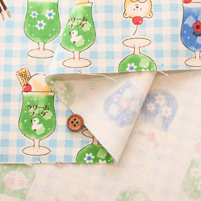 コットンオックスプリント生地 Delicious animal Retro クリーム
