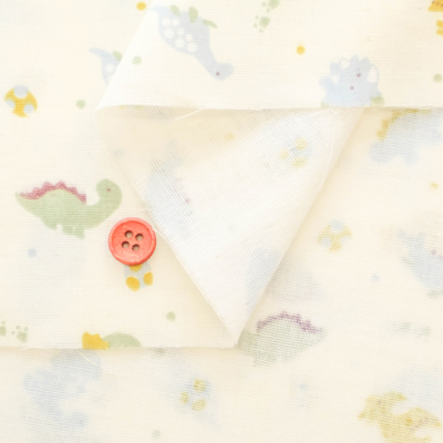 コットンダブルガーゼプリント生地 fluffy feeling きょうりゅう生地の