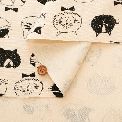 コットンオックスプリント生地 ネコの顔生地の通販|ノムラ